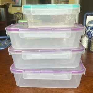 Four Snapware plastic food storage containers